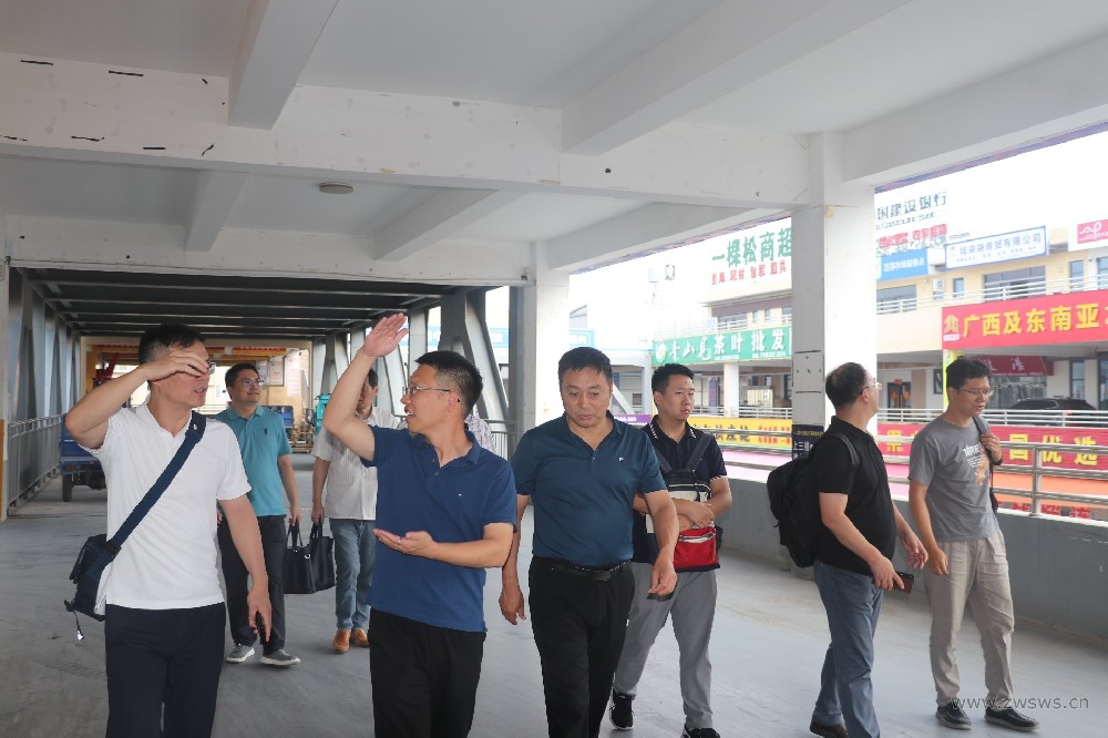 常州凌家塘市场总经理带队赴我院设计的郑州万邦市场开展考察工作